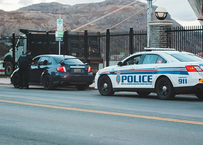 Police officer conducting traffic stop for violations